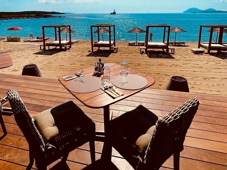Beachfront restaurant table with ocean view