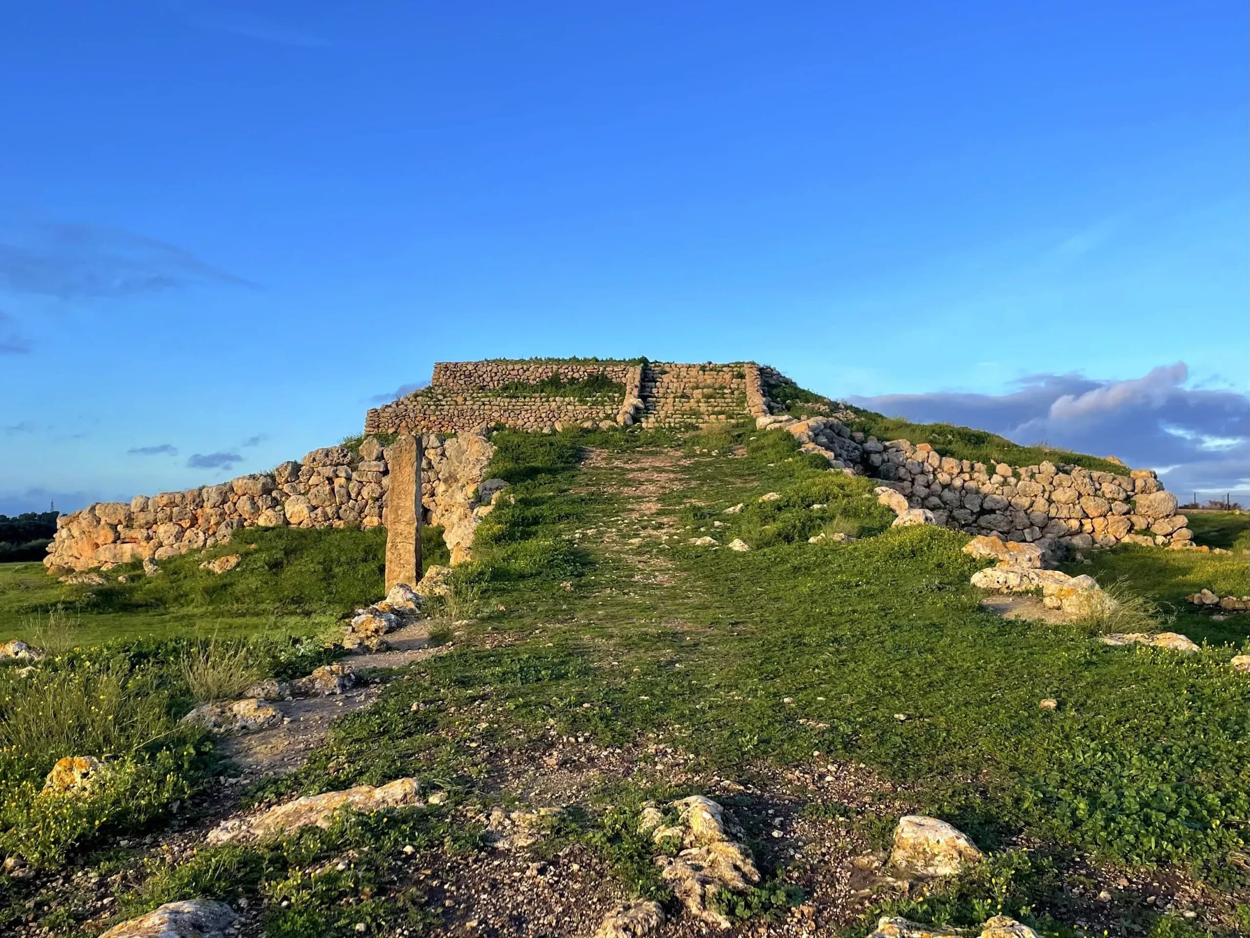 Ancient stone structure under clear blue sky