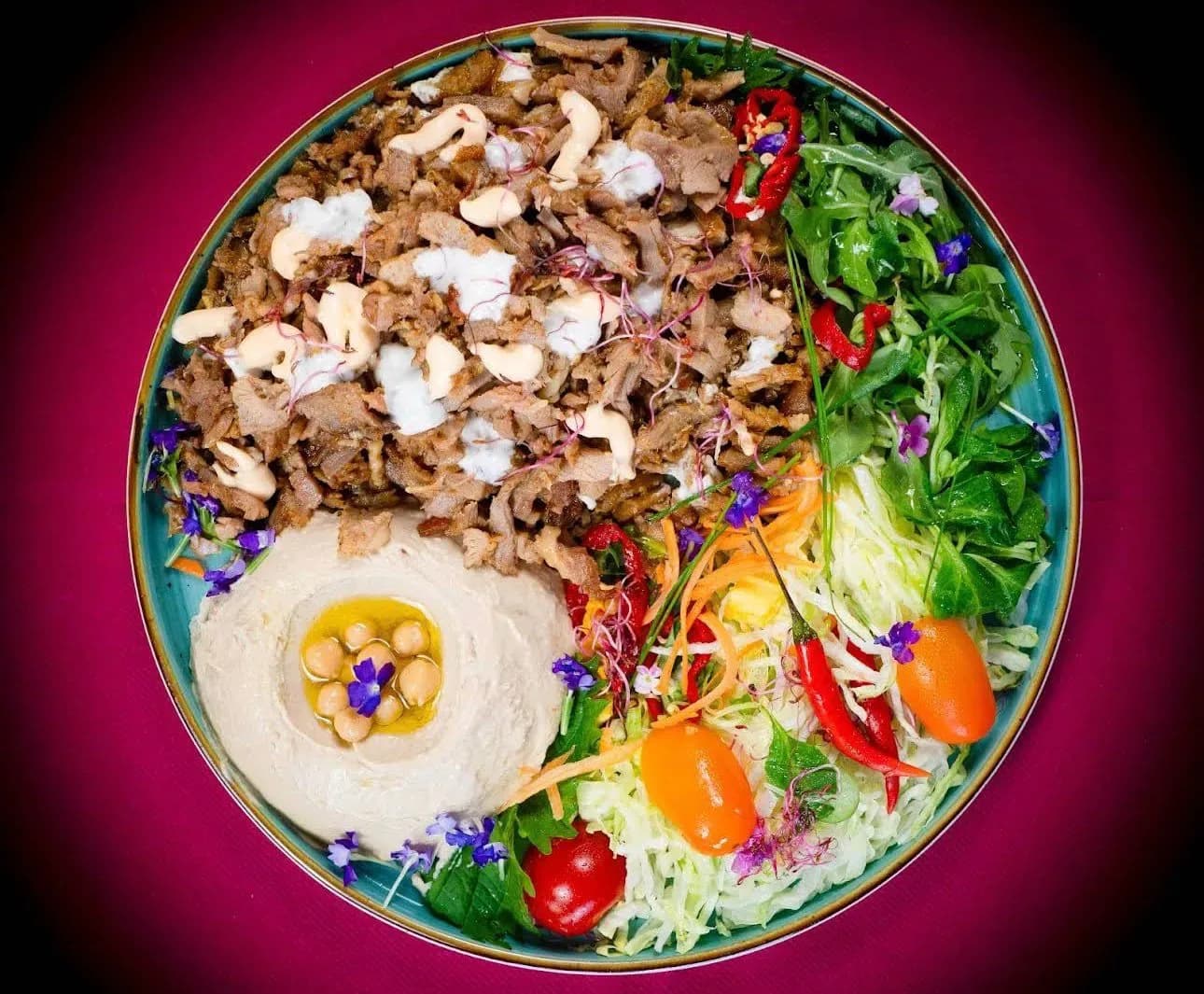 Delicious Shawarma Bowl with Hummus and Fresh Salad