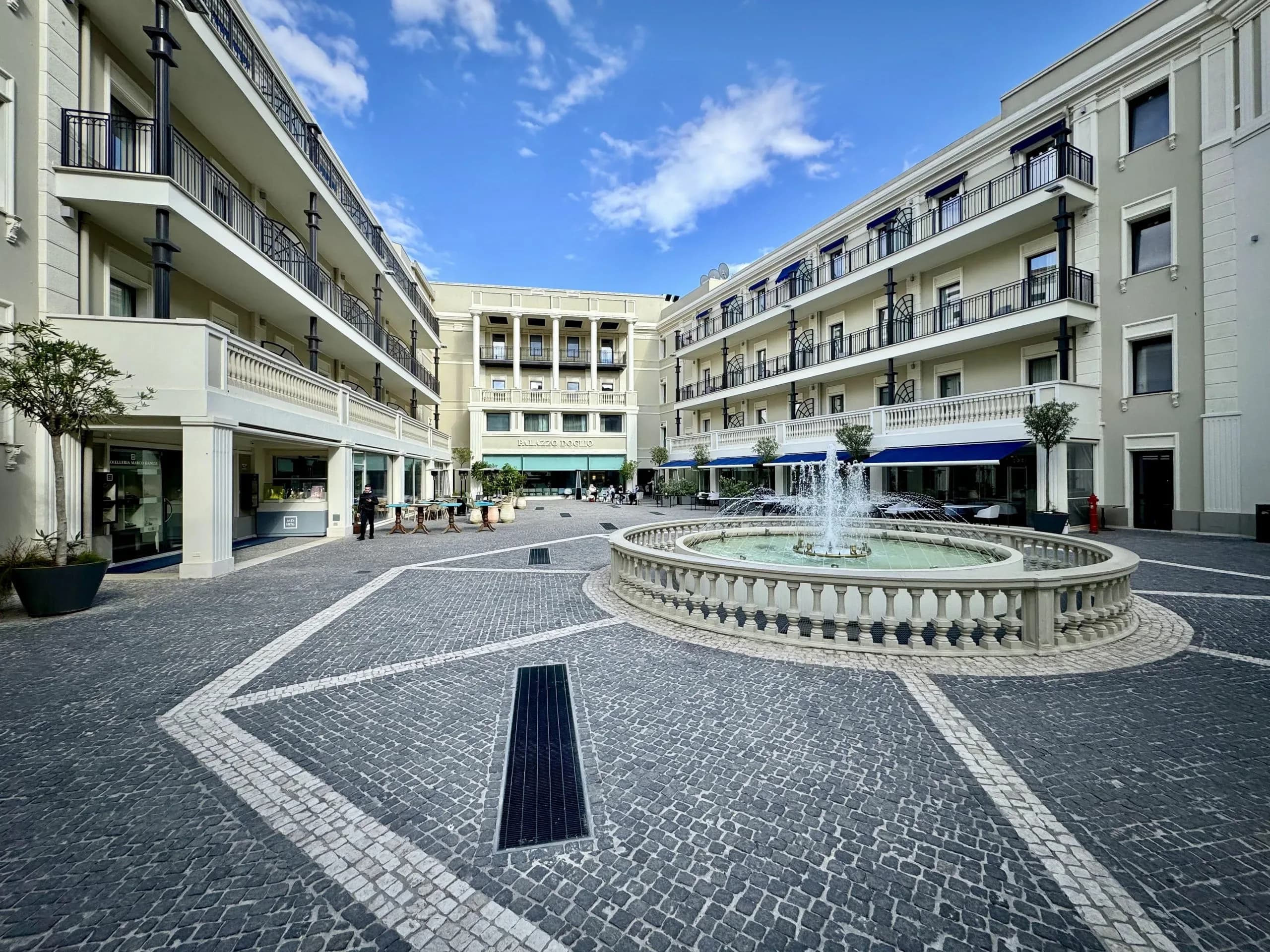 Palazzo Doglio hotel courtyard with fountain.