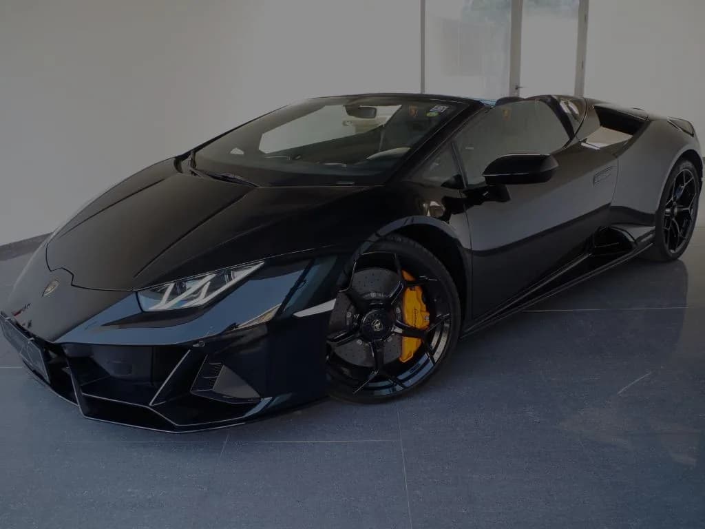 Black Lamborghini convertible in the Exclusive Car showroom