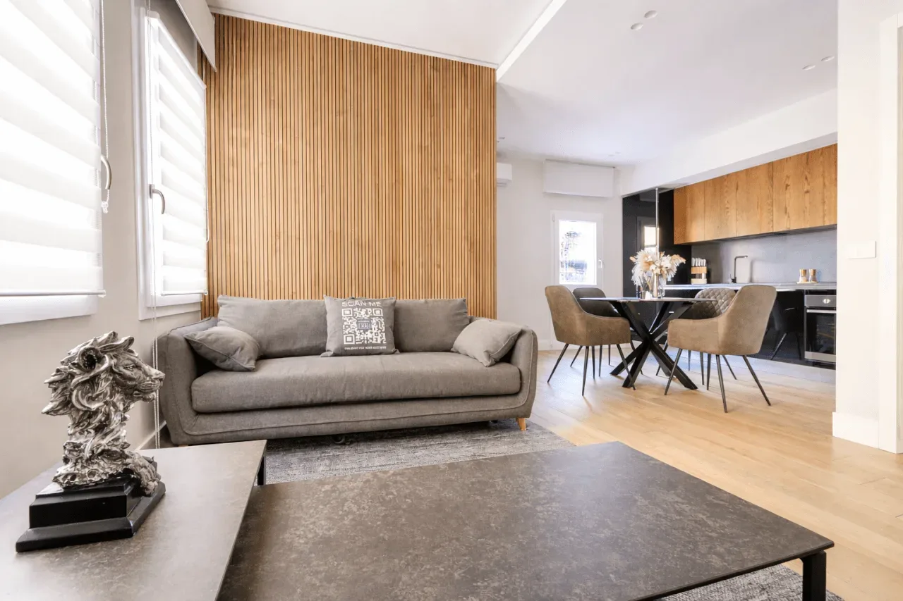 Living and dining area of a short-term rental apartment in Olbia, Sardinia