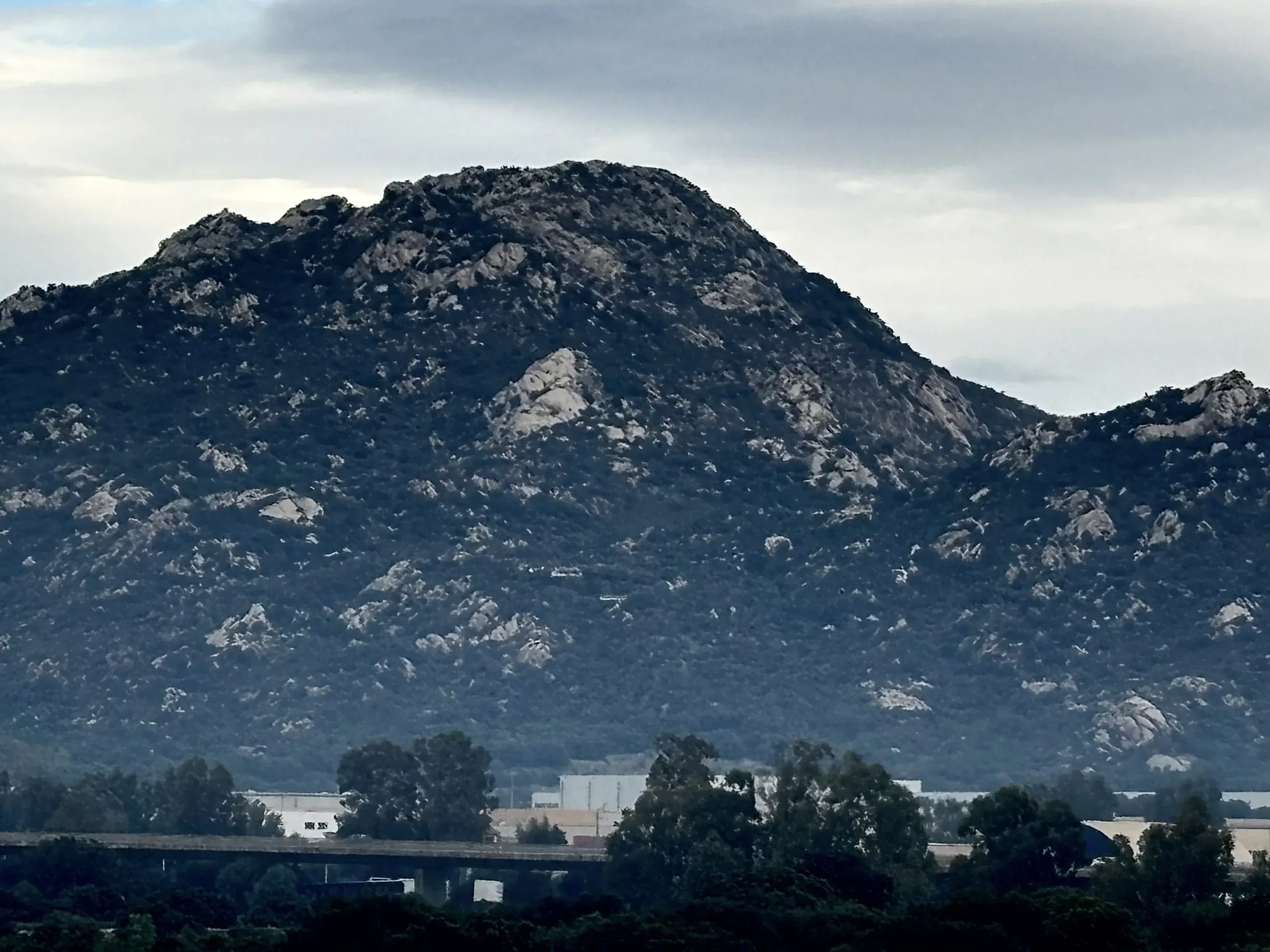 Rocky mountain with cloudy sky background