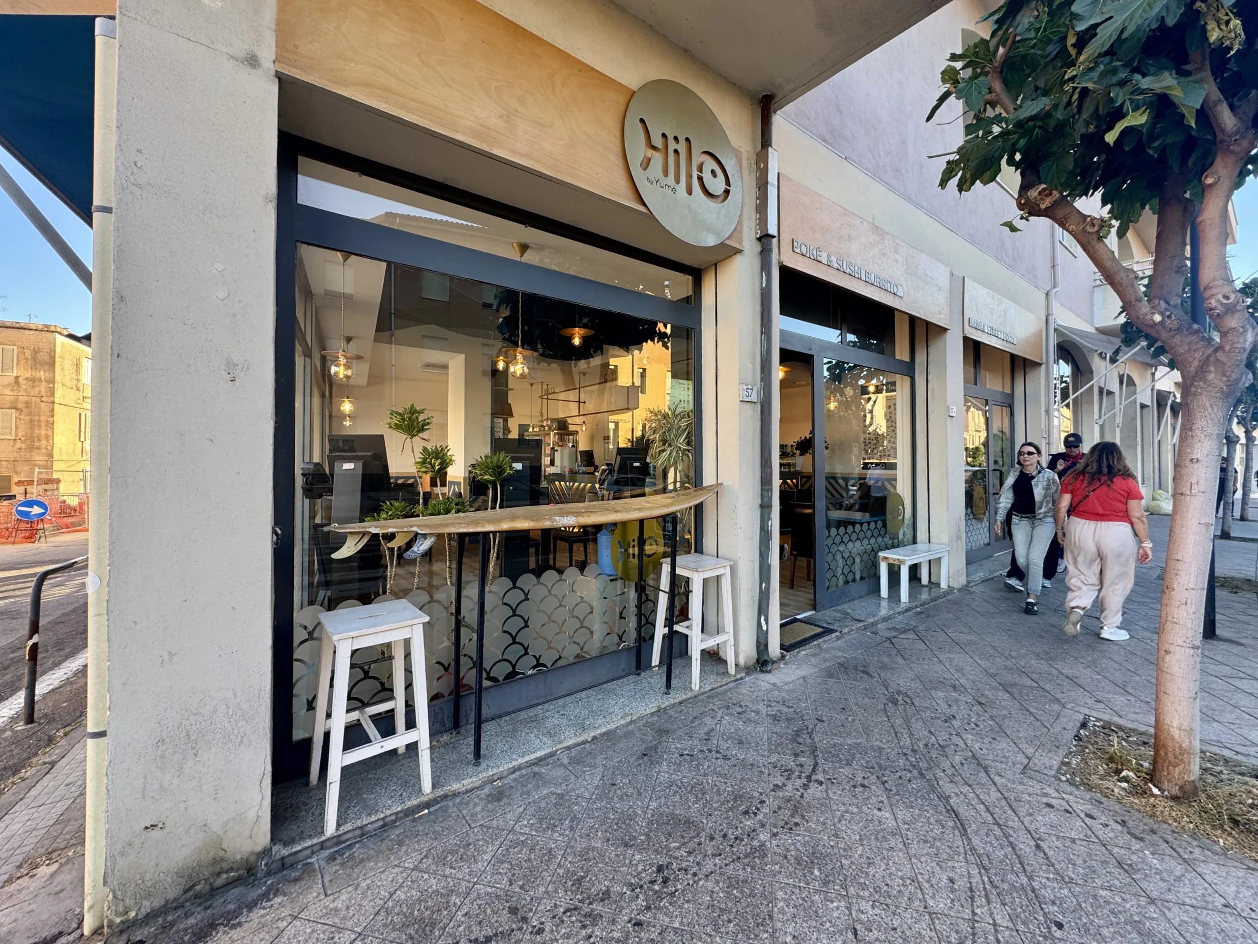 Hilo poke restaurant storefront on city sidewalk